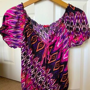 Bright multi-patterned top with drawstring keyhole